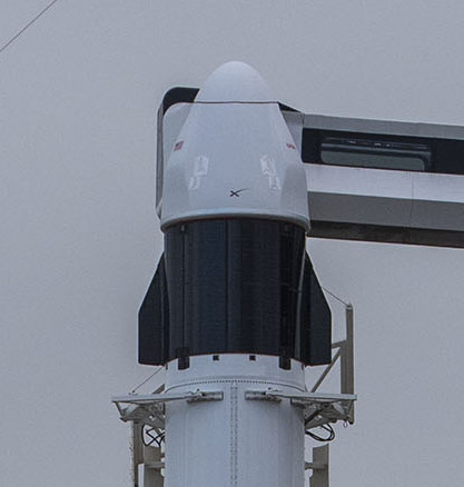 Cargo Dragon sits atop a Falcon 9 Rocket. Photo Credit: SpaceX