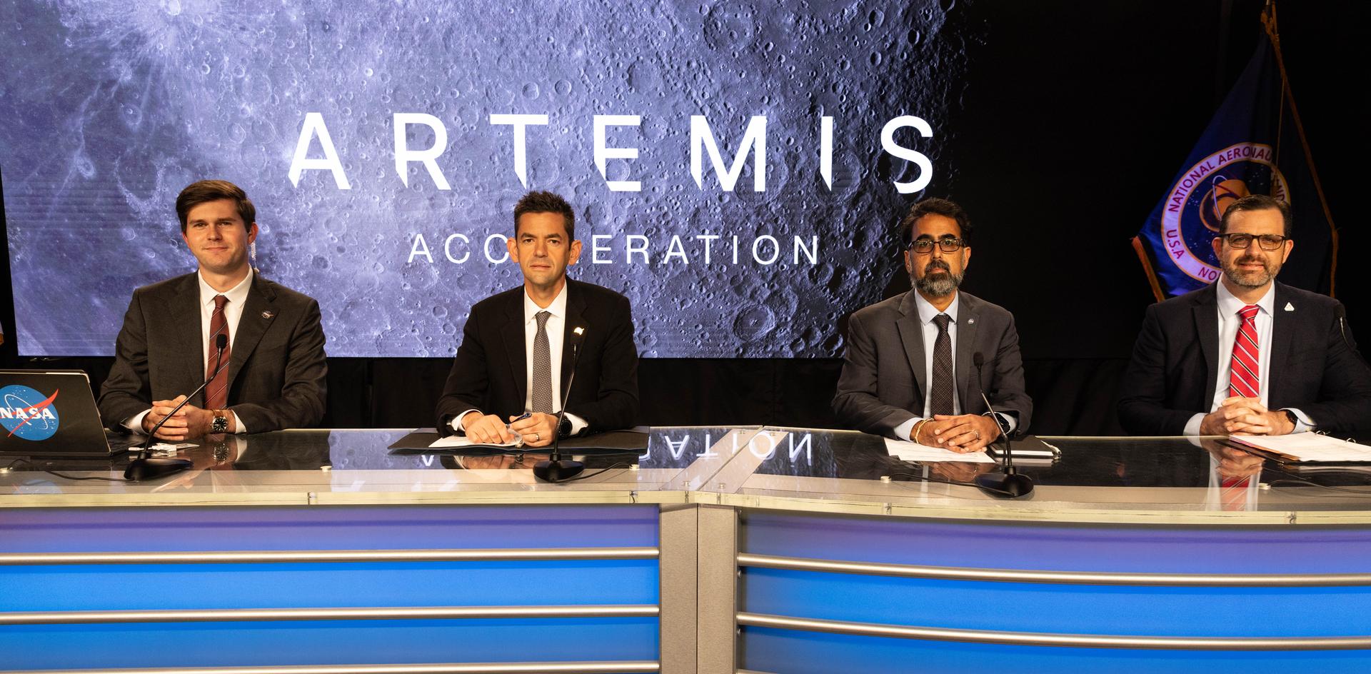 From left to right, NASA Deputy Press Secretary George Alderman; NASA Administrator Jared Isaacman; NASA Associate Administrator Amit Kshatriya; Jeremy Parsons, NASA’s Artemis program manager, participate in a news conference on Friday, Oct. 23, 2026, at the agency’s Kennedy Space Center in Florida. The briefing was to update media about NASA’s Artemis III mission that will send four astronauts to low Earth orbit in 2027 to test critical systems needed for future lunar landings, and how plans to return American astronauts to the Moon by 2028 are progressing.