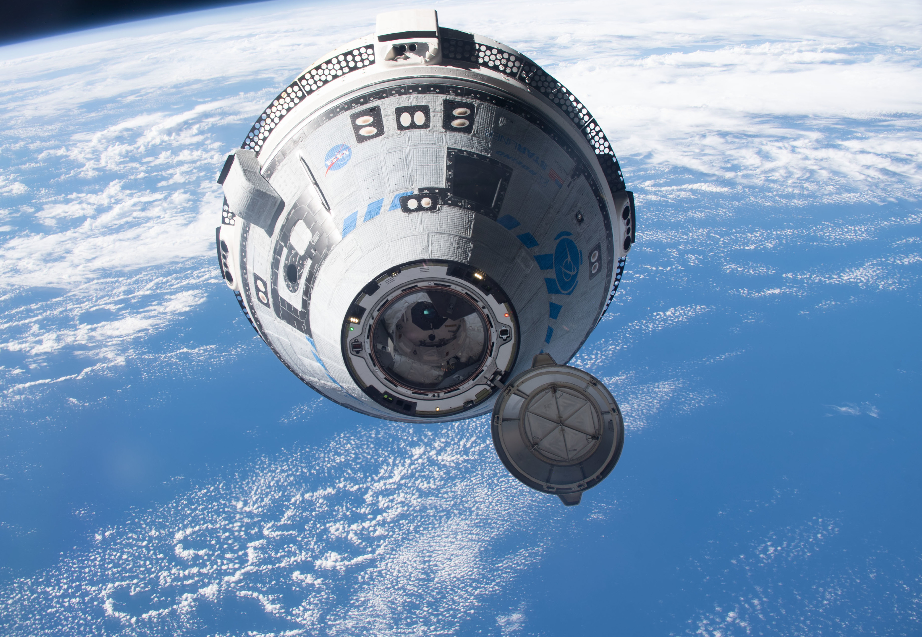 Boeing Starliner on approach to the International Space Station.